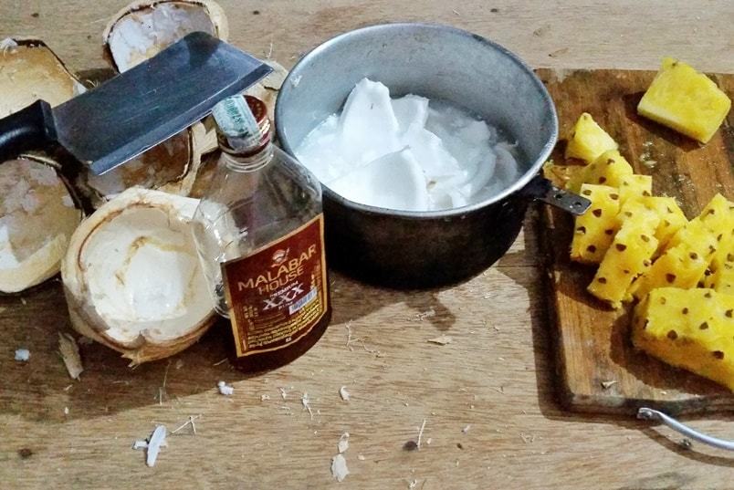 Alcohol in Alleppey: Kerala rum, coconut water, pineapple. Pina colada smoothie. Backpacking Kerala, India.