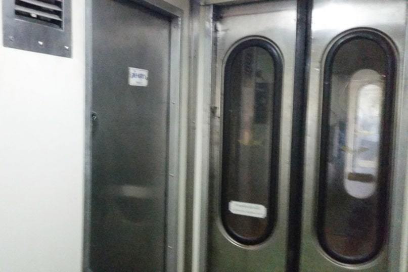 Overnight sleeper train in Thailand. toilet inside train. long distance thai railways. backpacking southeast asia travel blog