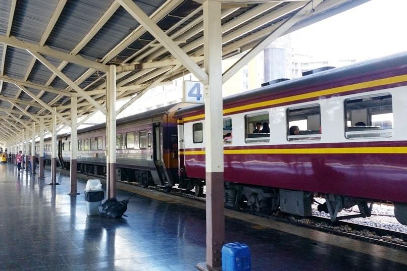 Overnight sleeper train in Thailand. train timings get on train. long distance thai railways. backpacking southeast asia travel blog
